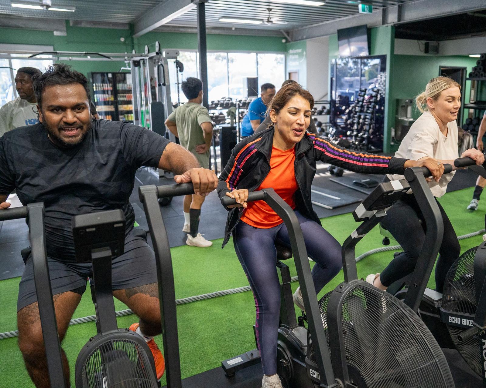 Members working hard on the bikes on the Sagitta gym floor